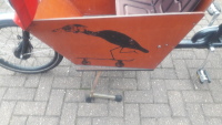 Skateboarding heron artwork on one side